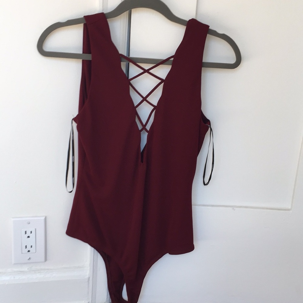 Wine Colored Low Cut Bodysuit